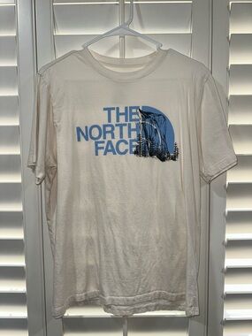 The North Face Women’s Cream Short-Sleeve Tee with Blue Mountain Logo